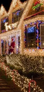 House adorned with bright Christmas lights at night.