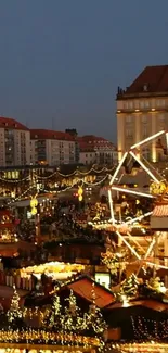 Festive Christmas market with lights and decorations at night, featuring a ferris wheel.