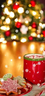 Festive red mug with Christmas cookies and lights.