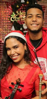 Two joyful musicians in red celebrating Christmas with instruments.