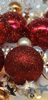 Red and gold Christmas ornaments with lights.