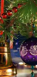 Christmas tree with purple ornaments and golden bell on festive wallpaper.