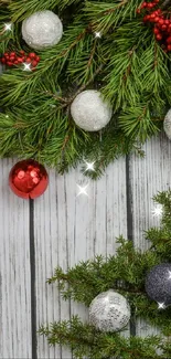 Festive Christmas wallpaper with pine branches, ornaments, and holly berries.