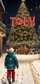 Child walking towards a decorated Christmas tree on snowy street.