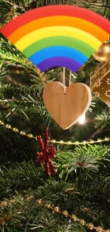 Decorated Christmas tree with rainbow and ornaments.