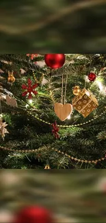 Decorated Christmas tree with red and gold ornaments and lights.