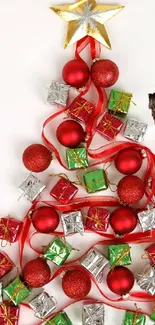 Decorative Christmas tree with red baubles and present boxes.