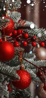 Christmas tree with red ornaments and festive decor.