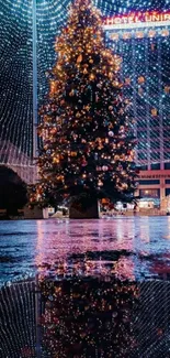 Christmas tree with festive lights reflecting on wet pavement.