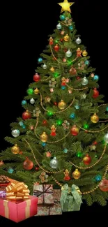 Beautiful Christmas tree with gifts and colorful lights wallpaper.