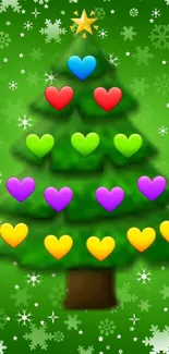 Vibrant Christmas tree with colorful hearts and snowflakes on a green background.