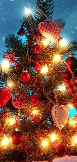 Christmas tree with glowing lights and ornaments in a snowy setting.