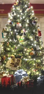 Festive Christmas tree with lights and gifts.