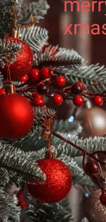 Christmas tree with red ornaments and merry Xmas text.