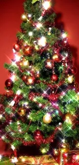 Vibrant Christmas tree with lights and gifts against a red backdrop.