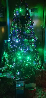 Vibrantly lit Christmas tree with gifts and decorations.