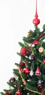 Decorated Christmas tree on white background mobile wallpaper.