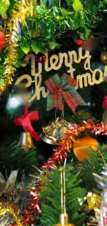 Festive Christmas decoration on tree with ornaments.