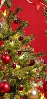 Festive Christmas tree with red ornaments on a vibrant background.