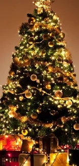 Brightly lit Christmas tree with gifts and golden decorations.