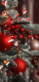 Festive Christmas tree with red baubles and green branches.