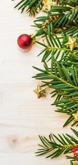 Festive Christmas wallpaper with pine branches and holiday decor.