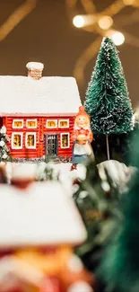 Cozy Christmas village with lights and snow.