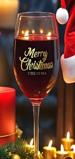 Christmas-themed wine glass with candles and Santa hat.