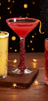 Vibrant cocktails with festive lights on a wooden table.