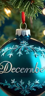 Teal Christmas ornament with 'December' on tree