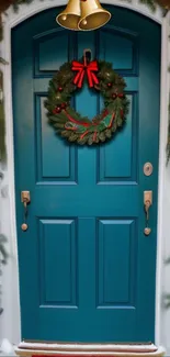 Festive teal door with Christmas wreath and holiday decorations.