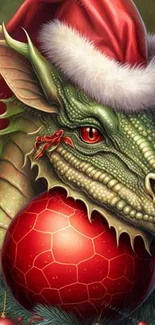 Festive dragon with Santa hat holding a red ornament.