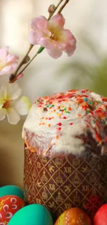 Easter cake with eggs and spring blossoms in festive wallpaper.