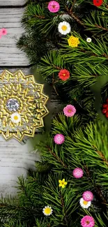 Festive wallpaper with pine branches, colorful flowers, and a golden ornament.