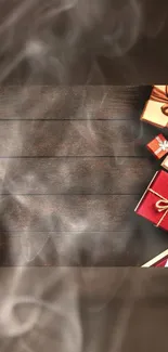 Gift boxes on warm wooden background with festive smoke.