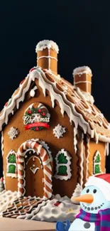 Gingerbread house with Christmas decor and snowman.