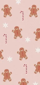 Gingerbread and candy cane holiday wallpaper with light pink background.