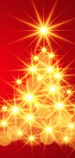 Golden star-shaped Christmas tree against a vibrant red background wallpaper.