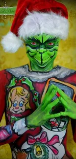 Green character in festive body paint with Santa hat on colorful background.