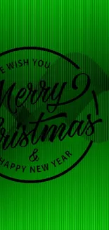 Green wallpaper with Merry Christmas greeting.