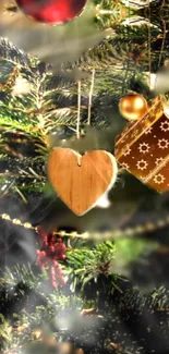 Wooden heart ornament on a festive Christmas tree.