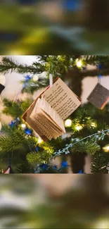 Festive tree with book ornament and lights in focus.