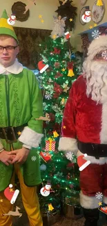 Santa and elf standing by a decorated Christmas tree in a cozy room.