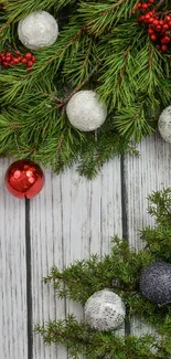 Festive garland with ornaments and berries for Christmas wallpaper.