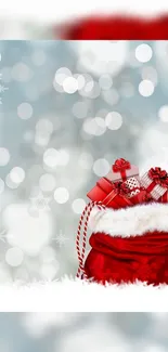 Red gift bag with presents in snowy holiday backdrop.