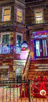 Festively decorated house with bright holiday lights and a snowman.