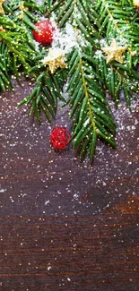 Festive holiday wallpaper with pine branches and ornaments.