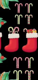 Festive mobile wallpaper with Christmas stockings and candy canes on a black background.