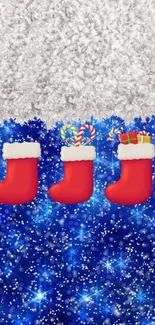 Festive red stockings on a blue and snowy background with stars.