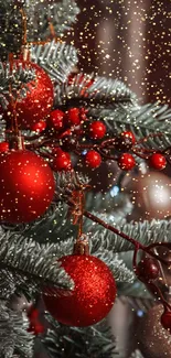 A Christmas tree adorned with red and gold ornaments.